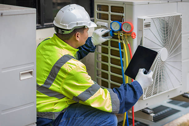 Professional Air Duct Cleaning technician working in Red Hook, NY